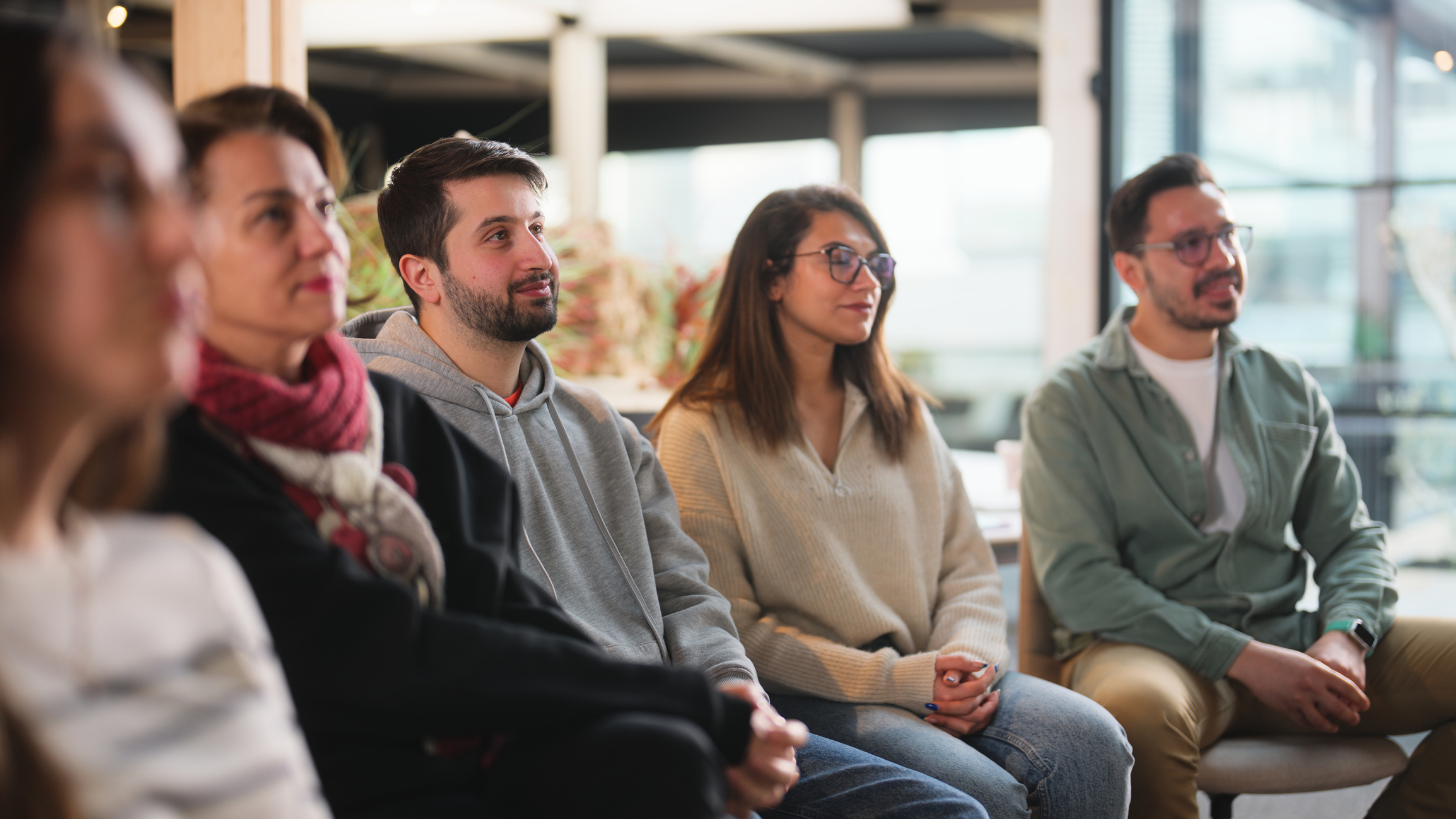 Group of business people listening to business speech